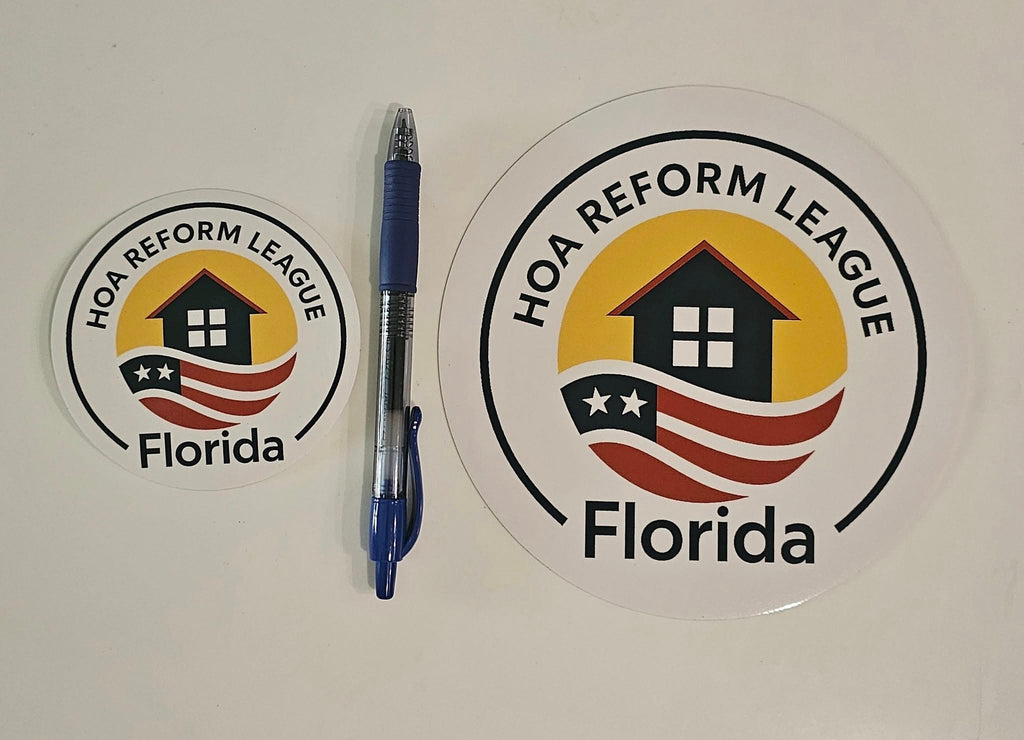 Size reference 3.5" beside 6" sticker with pen for scale reference